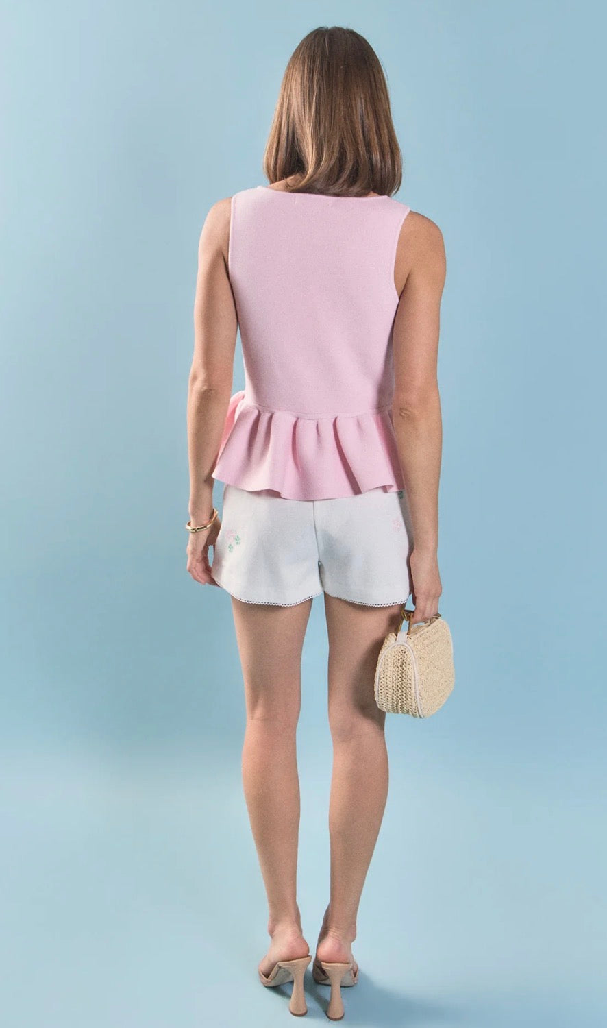 Pretty in Pink Peplum Knit Top